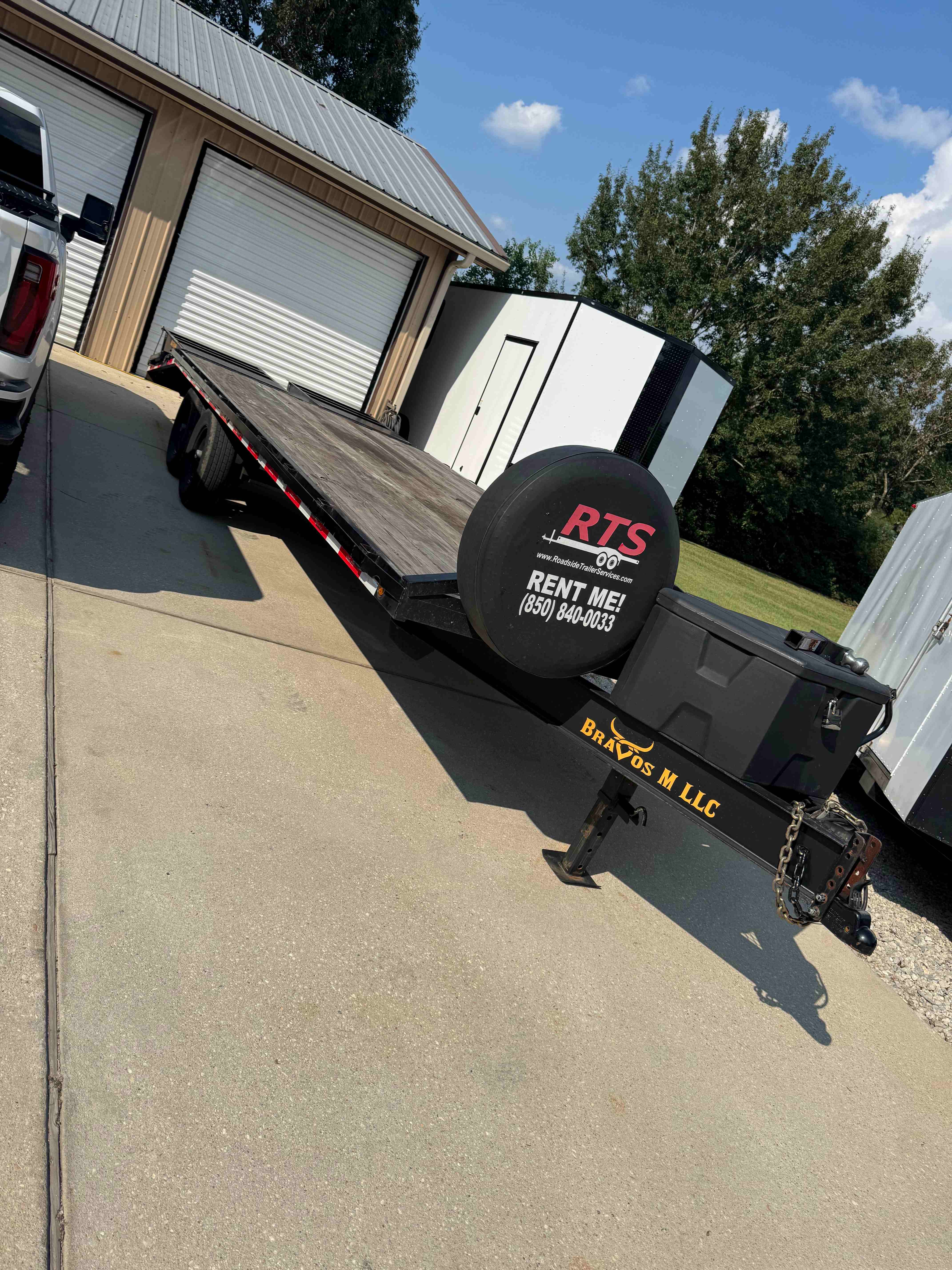 24ft Deckover Flatbed Trailer - Front View with 2-5/16 inch ball hitch and 14,000 lb GVWR capacity