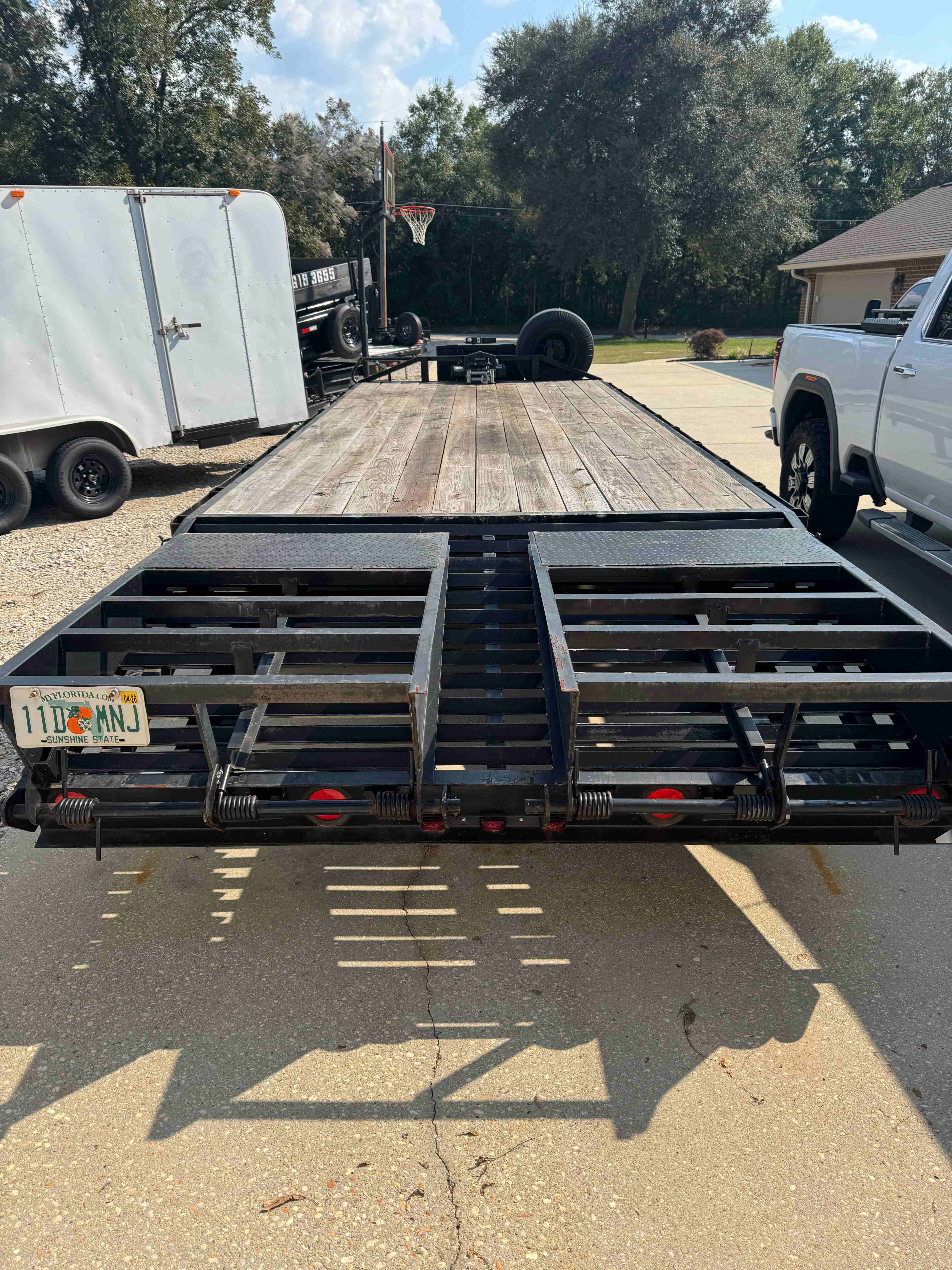 24ft Deckover Flatbed Trailer - Rear View showing mega ramps for easy loading of heavy equipment and machinery