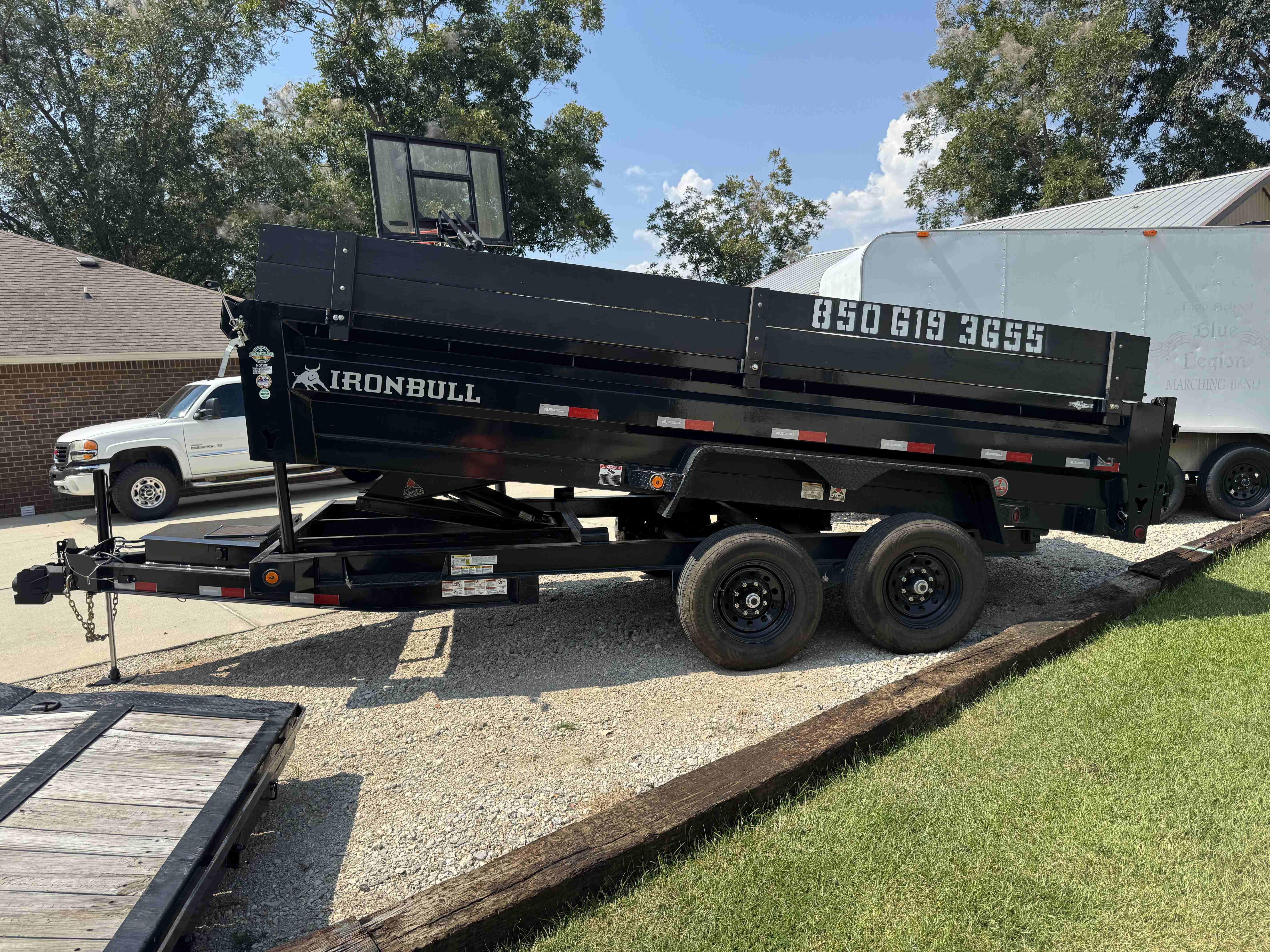 Ironbull 7x16 Dump Trailer rental - Ideal for landscaping, construction debris, and heavy-duty hauling jobs in Cantonment, FL