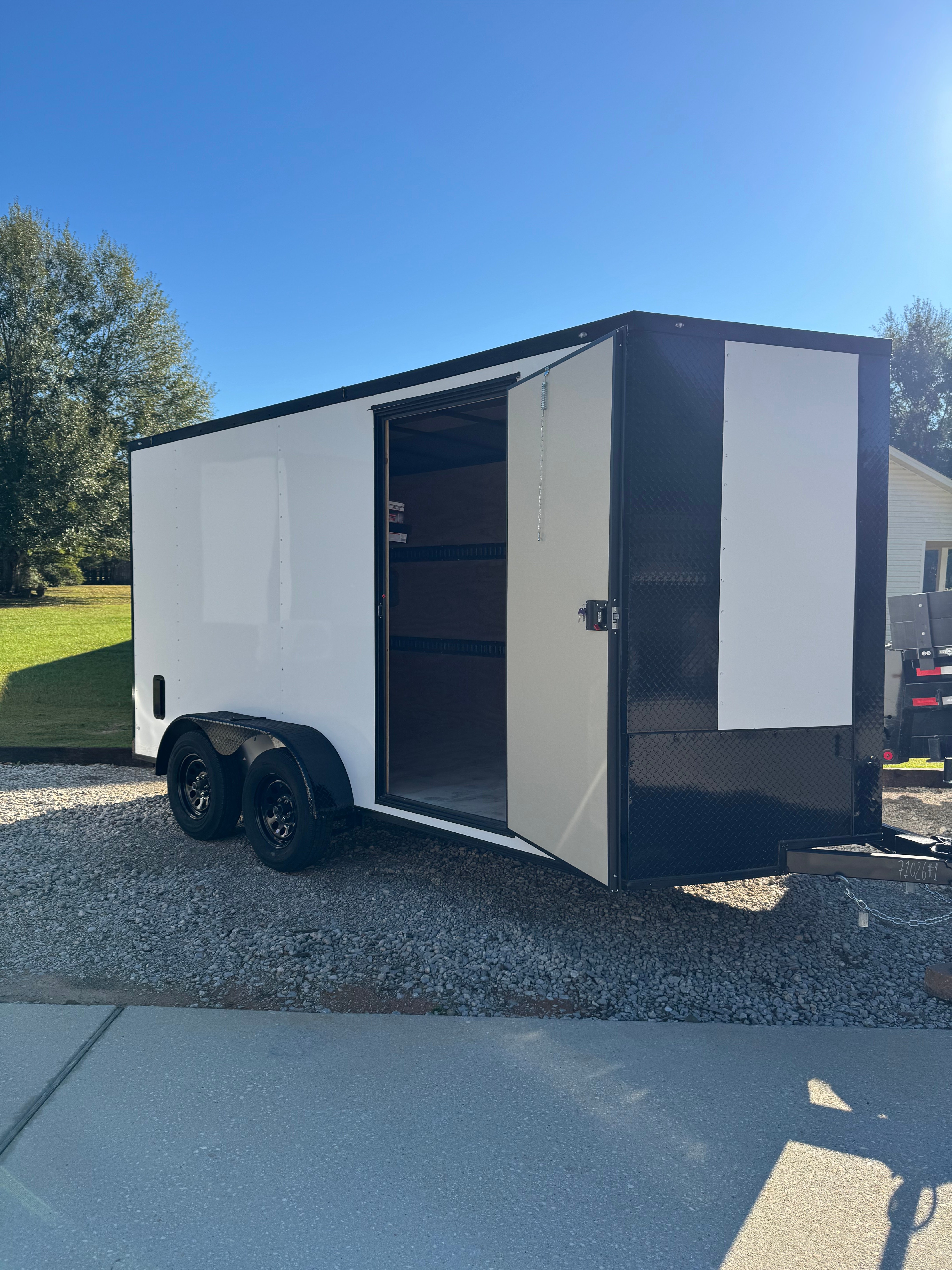 7x14 Enclosed Trailer rental - Secure enclosed cargo trailers for protected transport of goods and equipment in Cantonment, FL