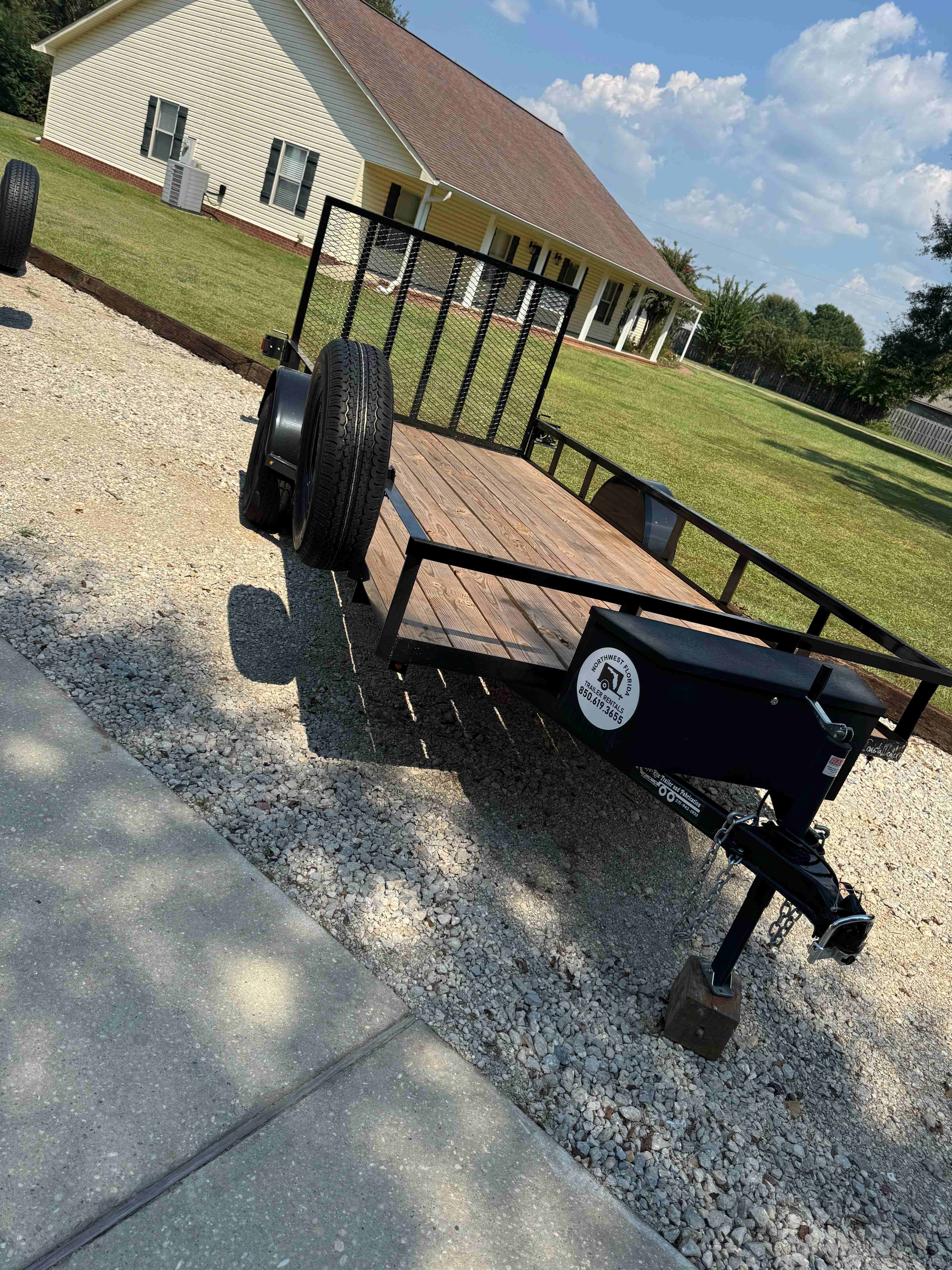 6x14 Utility Trailer - Front View showing 2-inch ball hitch and safety chains